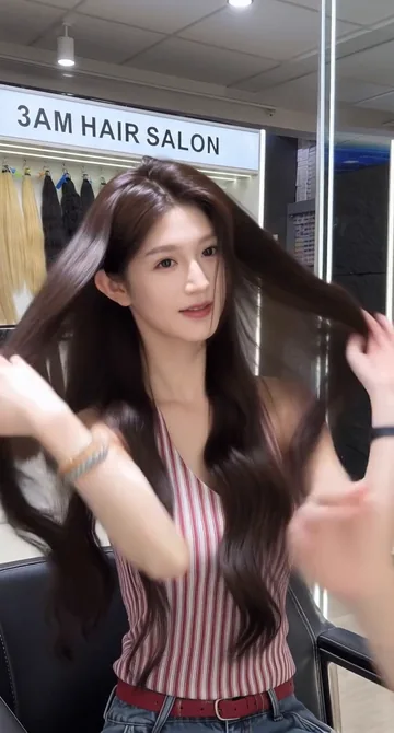 AI style reference · Dark espresso-brown long hair with a softly curved shape.